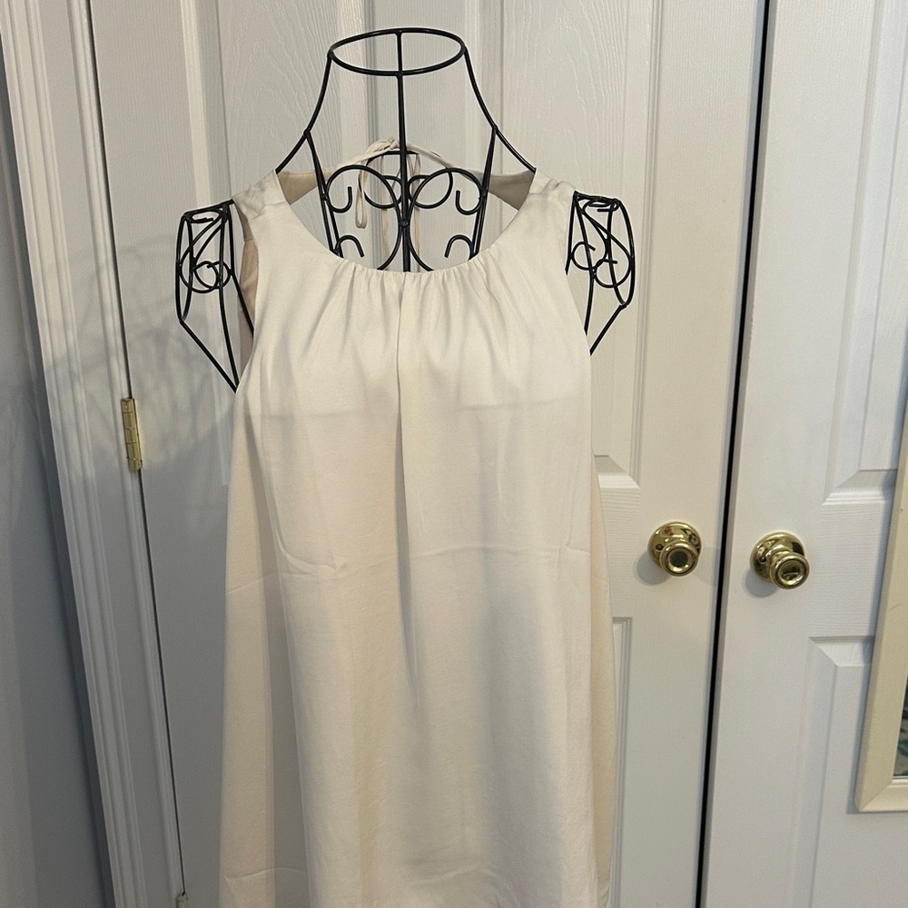 Elegant Cream Sleeveless Blouse